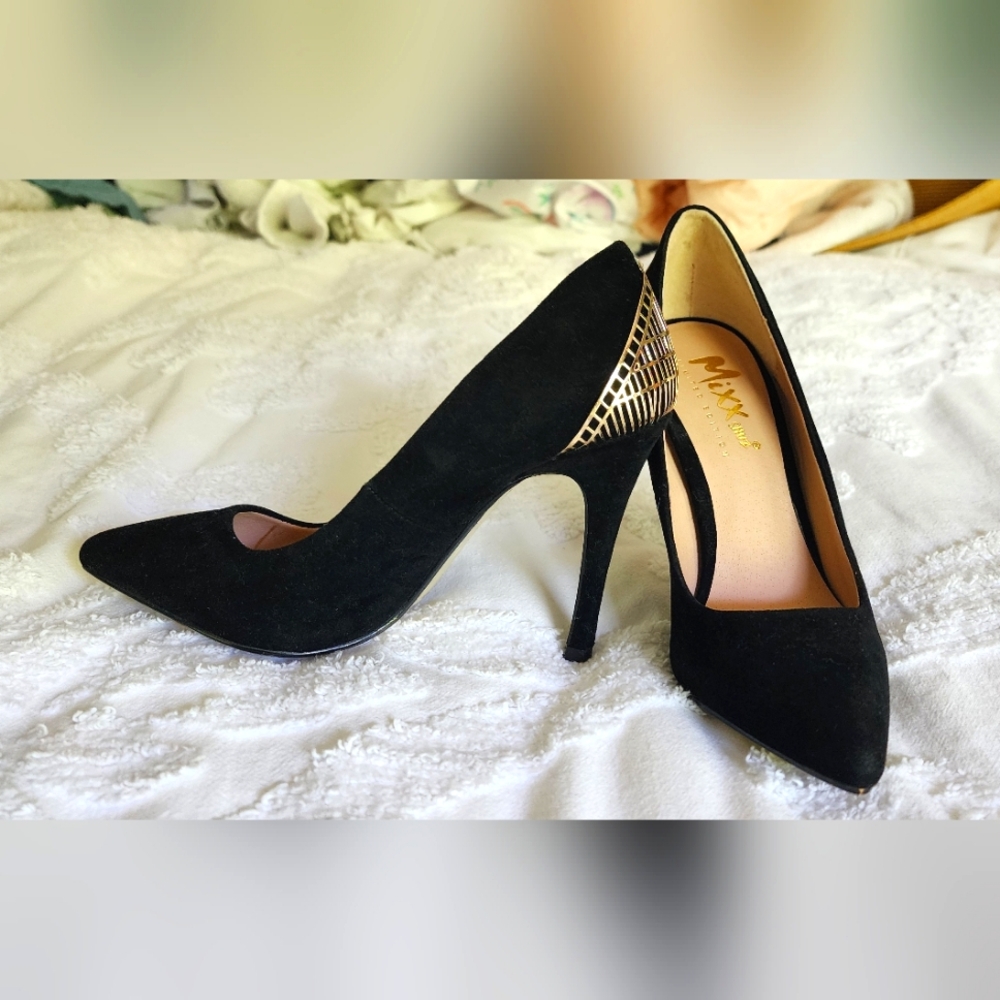 Velvet black heels with gold metal detail on heel